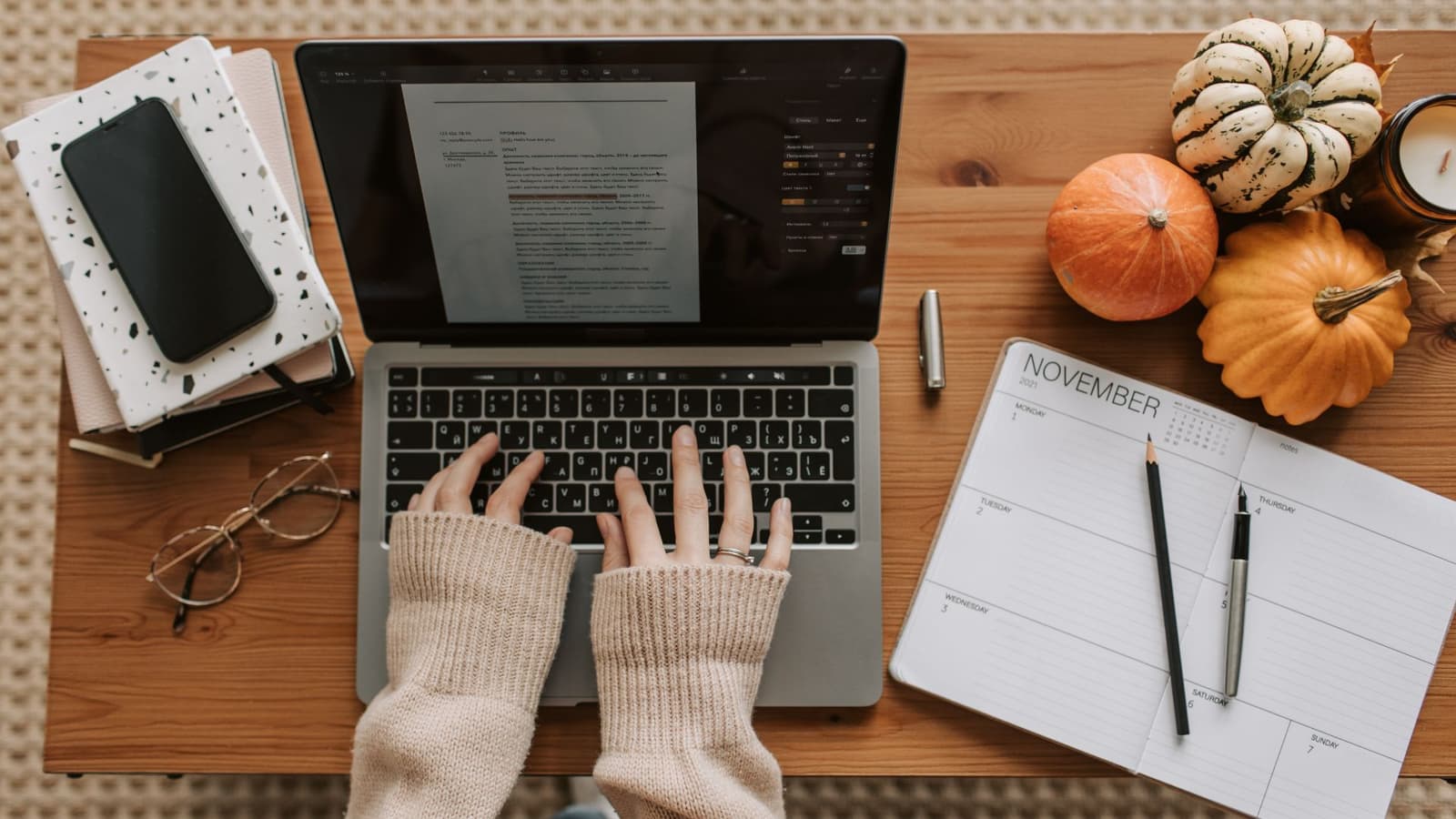 Hands typing on a laptop during an online CPD course