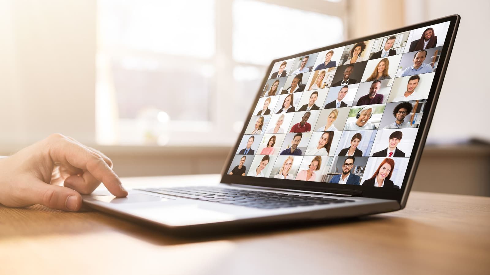 A mentor on a video call with a nurse